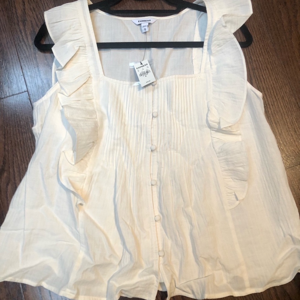 Express sleeveless top with ruffles